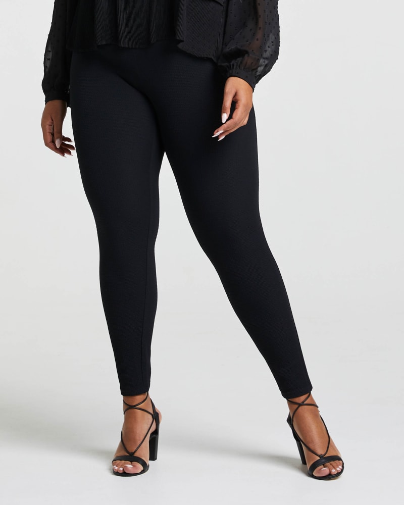 Side of a model wearing a size 1X Hart Pant in Black by Estelle. | dia_product_style_image_id:248434